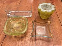 Overview of four glass bowls/dishes