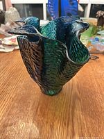 Full view of vase showing color gradient, texture, and ruffled rim