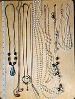 All eight necklaces laid out for overview