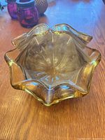 Top view showing ruffled rim and interior swirl pattern