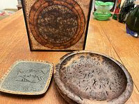 Burl bowl, stoneware trivet, additional background item visible
