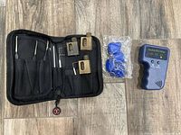 Full kit showing open Sparrows pouch with tools, three practice locks, RFID writer and bag of fobs