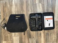 Overall lot showing Naipo cushion, Wattne W2 massager in case with accessories