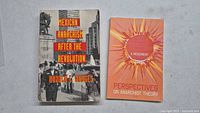 Two paperback books: Mexican Anarchism After the Revolution by Donald C. Hodges and Perspectives on Anarchist Theory: A Movement, laid flat showing front covers.