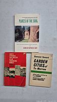 Front covers of three books: Places of the Soul, Man's Struggle for Shelter, Garden Cities of To-Morrow