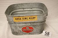 Front view showing Wheeling and Dura-Zinc-Alloy labels