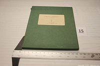 Front of green portfolio case with scale
