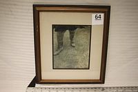 Front view of framed print with frame and mat visible