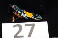 Front view of painted Baltimore Oriole brooch with lot marker