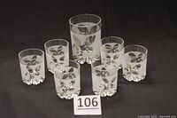 Seven-piece set on black background showing pattern and quantity