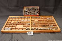 Overall view of wooden type case with blocks and separate box of blocks