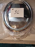 Metal lid resting on bubble wrap