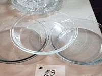 Top view of three clear Pyrex pie plates