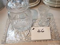 Tray, candy jar with lid, and bud vase grouped together