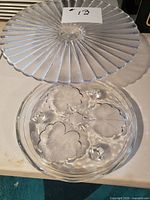 Top view of pedestal cake stand above floral plate