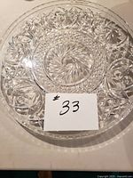 Top view of round pinwheel cut glass tray