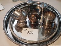 Overall view of tray with all six silver-plate pieces