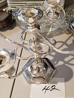 Full view showing five arms, hexagonal base and overall form