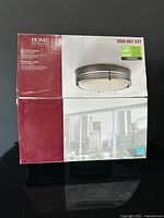 Sealed retail box front showing product image and model number