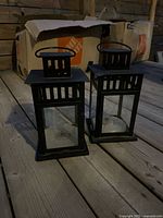 Both lanterns on deck showing size and wear