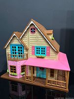 Front and side view of closed cottage showing exterior details