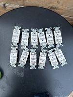 All 12 Leviton white TR receptacles displayed face up