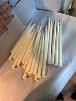 Full group of 24 ivory battery taper candles