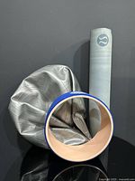 Overall lot showing mat, ball, wheel