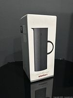 Front of retail box showing jug image and branding