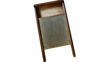 Full view of wooden washboard showing frame and metal panel