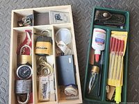 Overall view of two trays with assorted items