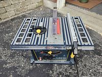 Full view of Mastercraft 10" bench table saw on ground