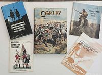 Group shot of all five military books