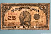 Full front view of the 1923 Dominion of Canada 25-cent note showing entire design, serial number, and wear