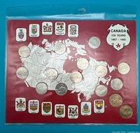 Full view of coin set in sleeve showing all fifteen coins and map card