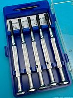 Full view of five nut drivers in blue case