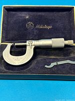 Micrometer, case interior, wrench visible