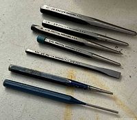 All seven punches and chisels laid out