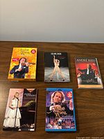 All five concert video cases laid out