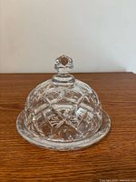 side view of dome-lidded crystal butter dish