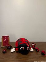 Group shot of all seven ladybug items on tabletop