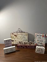 All six plaques displayed on table