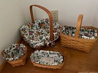 All four Longaberger baskets grouped