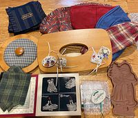 Group shot showing fabric liners, wooden lids, terracotta mold and ornament box