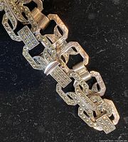 Close view of marcasite-set links and clasp
