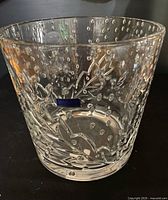 Side view showing Marquis sticker and pattern