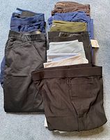 Nine folded pants showing colors and quantities