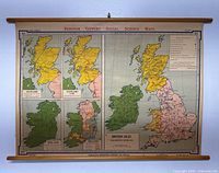 Full front view of the Denoyer H17 British Isles map mounted on wooden rods showing complete map and multiple inset maps of Scotland and Ireland.