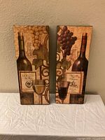 Two vintage style wine and grape themed canvases side-by-side showing wine bottles, grape clusters, and wine glasses.