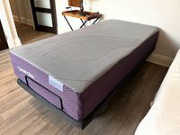 Flat view of mattress on adjustable base in room